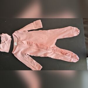 Pink Ruffled Baby One Piece Footie.